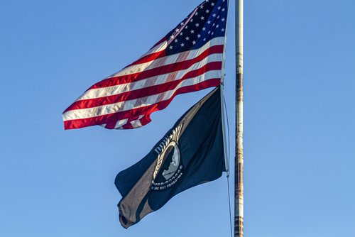 United States flag and POW / MIA flag